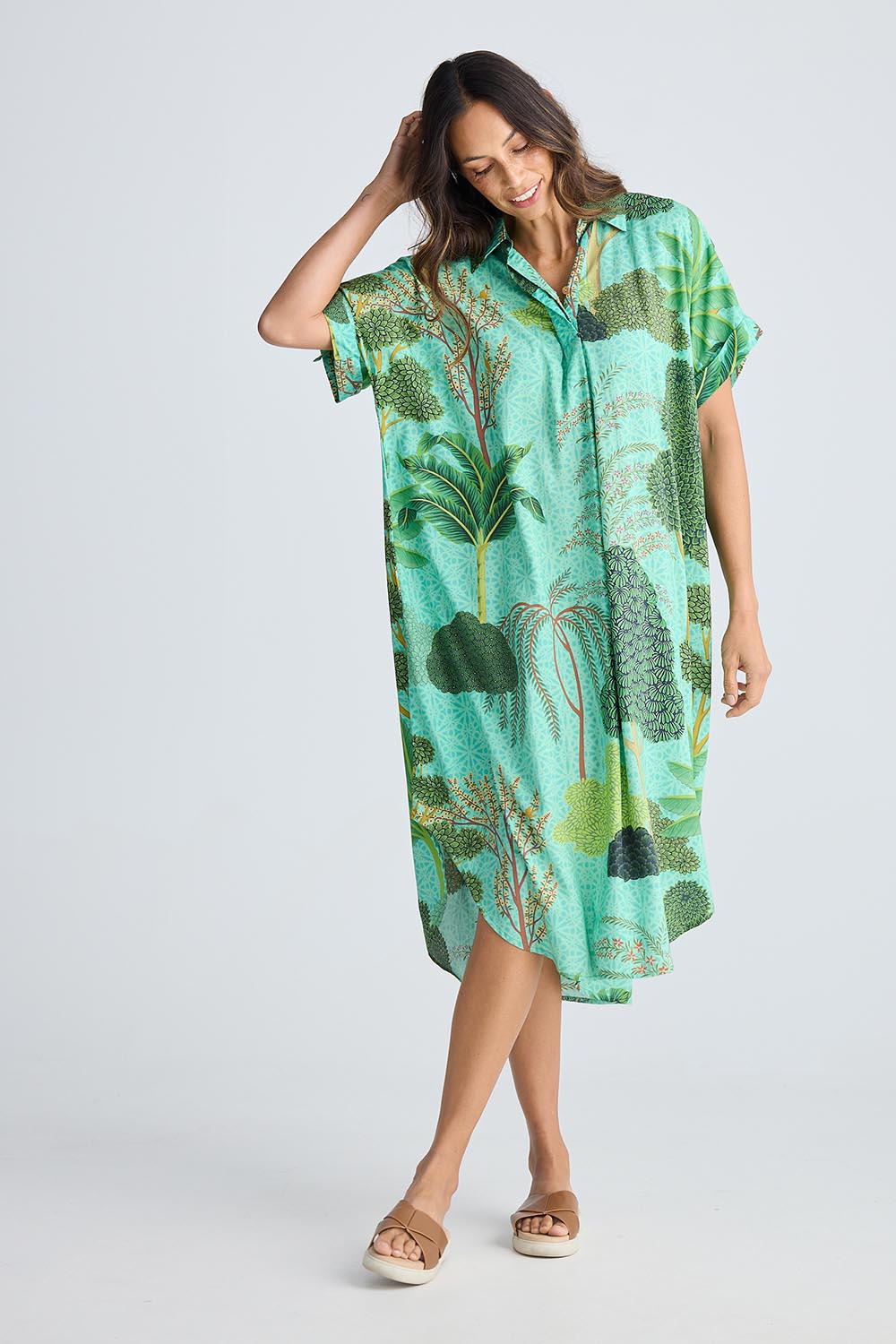 A model wearing the Canal Modal Overshirt in colour Rainforest, from the front, showing the whole outfit