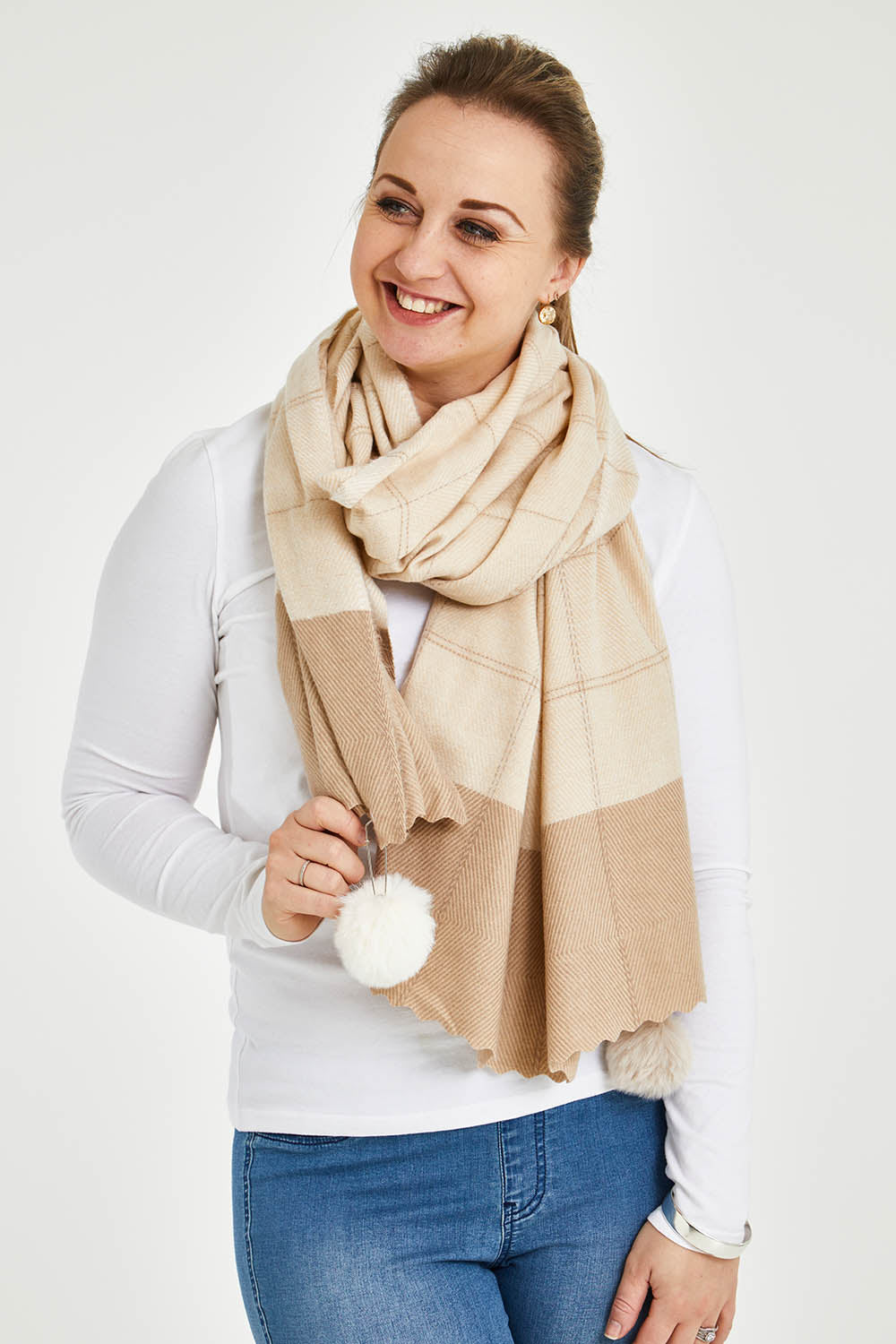 Model Steph wearing size OneSize of the Chey Scarf in colour Natural, from the front, cropped image