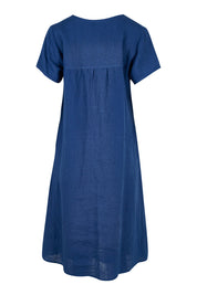 Product shot of the Sabi Dress in colour Ocean (Blue), from the back