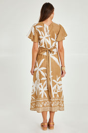 Model Madeline wearing size S of the Tropics Wrap Dress in colour Haven, from the back