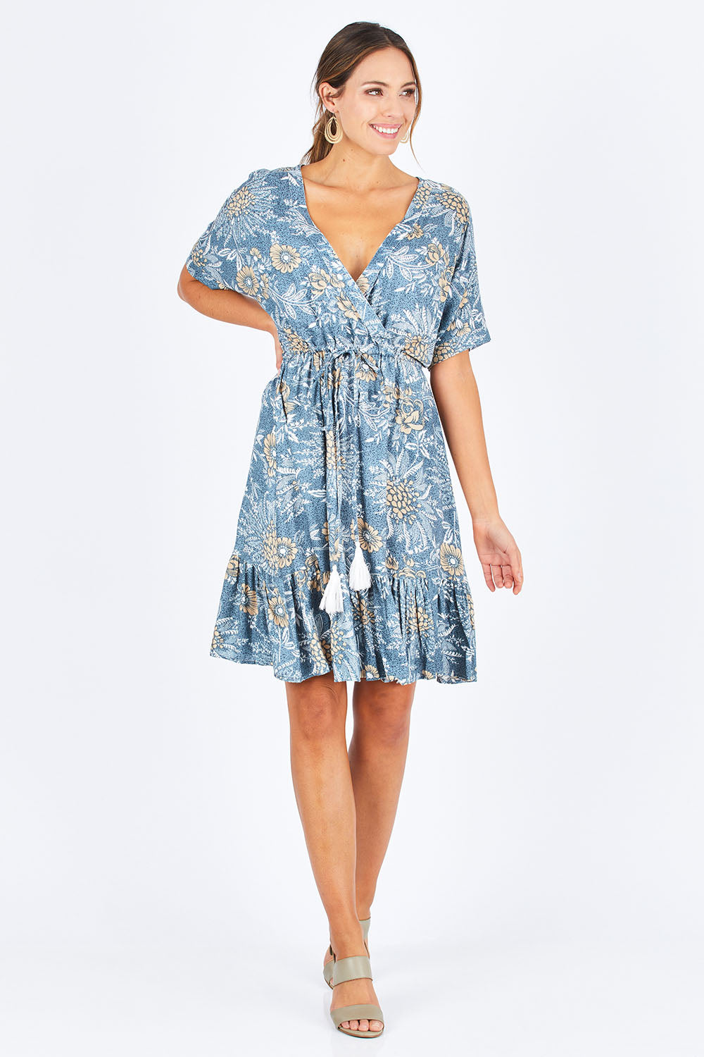 Model Madeline wearing the Boardwalk Dress in colour Havana (Blue), from the front, showing the whole outfit