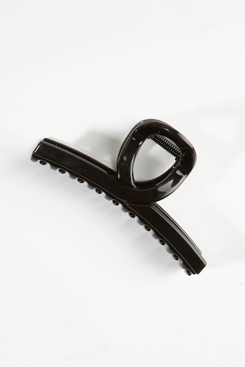 A model wearing size OneSize of the Slider Hair Clip in colour Black (Black), from the front, showing the whole outfit