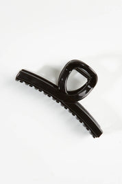 A model wearing size OneSize of the Slider Hair Clip in colour Black (Black), from the front, showing the whole outfit