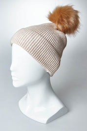 A model wearing size OneSize of the Beach Port Beanie in colour Nut, from the front, showing the whole outfit