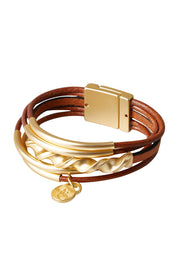 Product shot of the Kaur Bracelet in colour Tangold, from the front