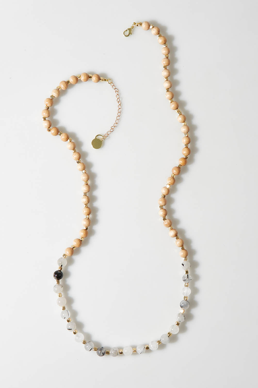 A model wearing size OneSize of the Sunset Long Necklace in colour Black (Black), from the front, showing the whole outfit