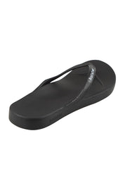 Product shot of the Islander Thong - Black in colour Black, from the back