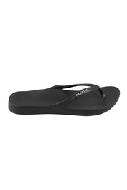 Product shot of the Islander Thong - Black in colour Black, from the front