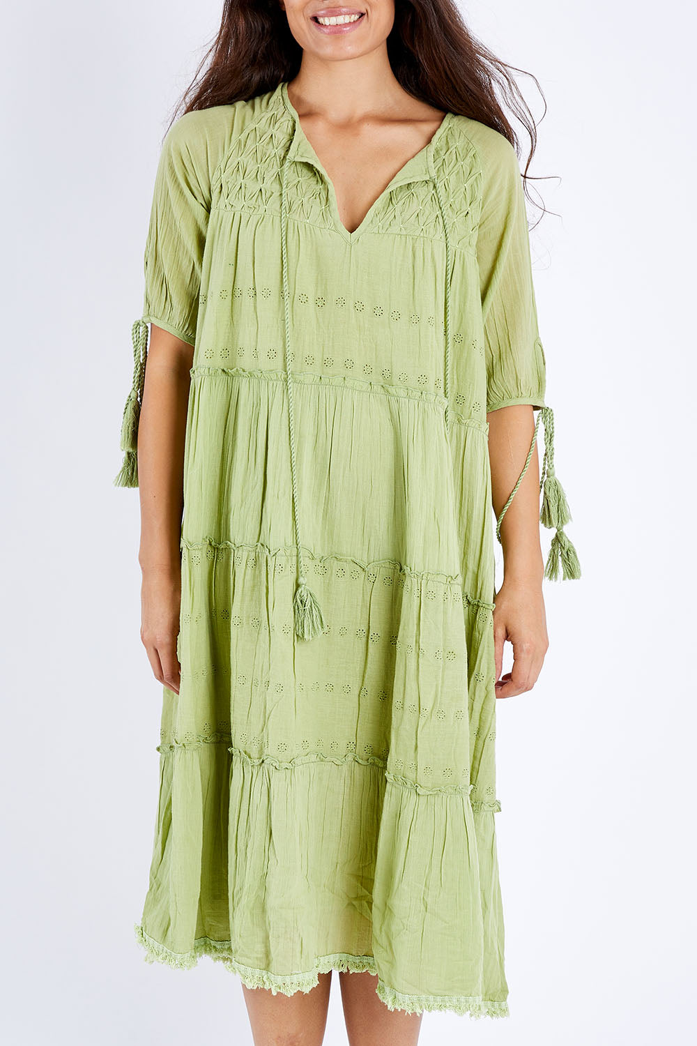 Model Larissa wearing size S of the Dandelion Dress in colour Leafgreen (Green), from the front, cropped image