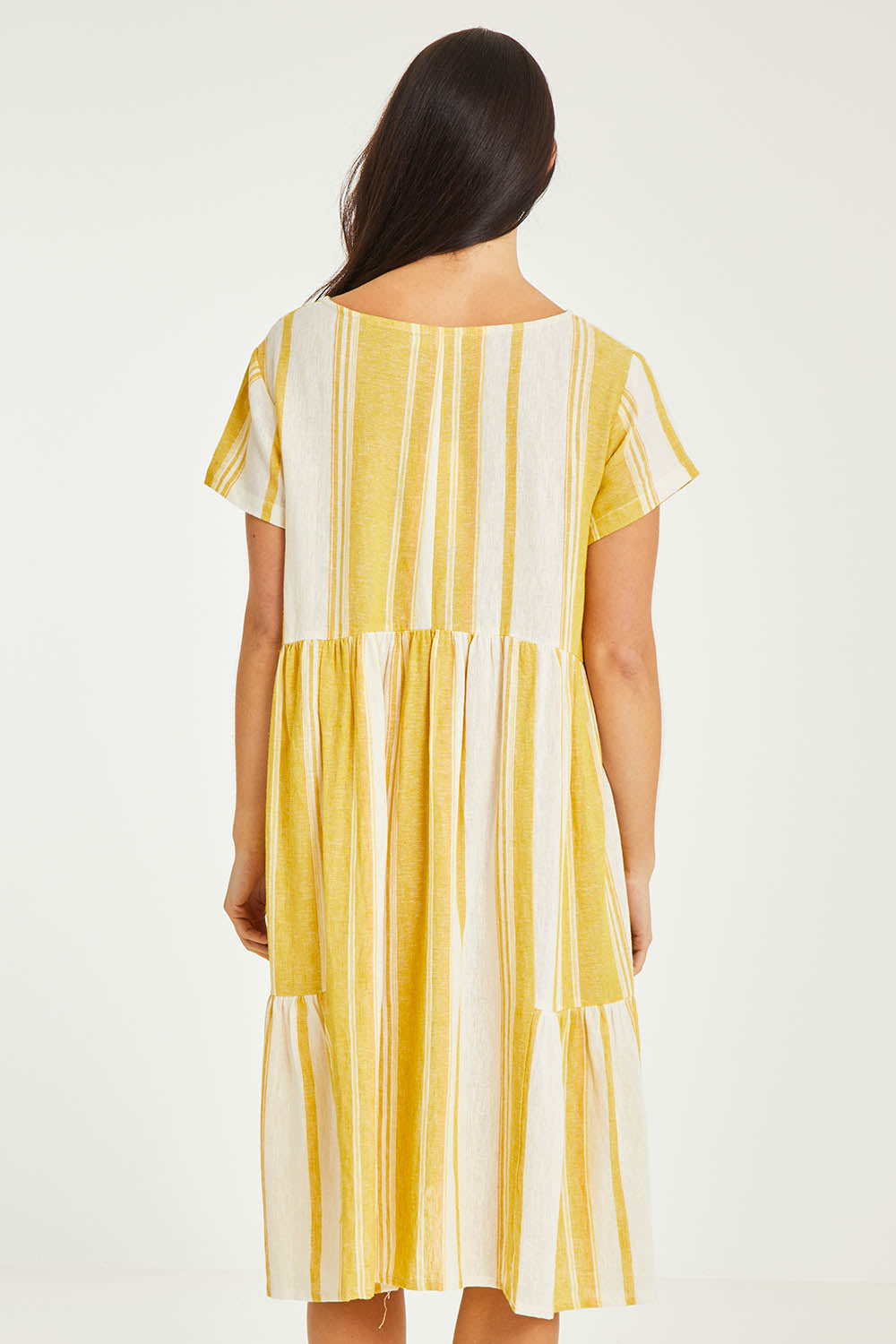 Model Stacey wearing size 10 of the Aireys Dress in colour Lemondrop, from the back