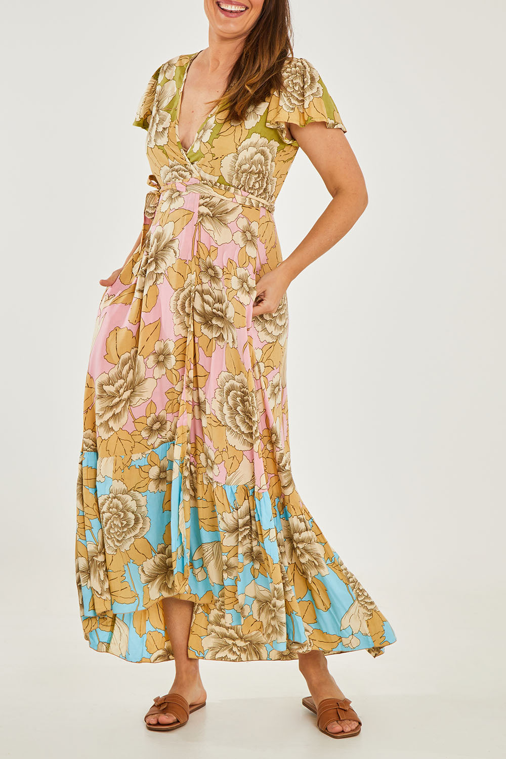 Model Georgia wearing size 10 of the Margarita Dress SS in colour Botanical (Pink), from the front, cropped image