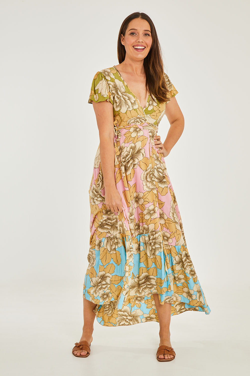 Model Georgia wearing size 10 of the Margarita Dress SS in colour Botanical (Pink), from the front, showing the whole outfit