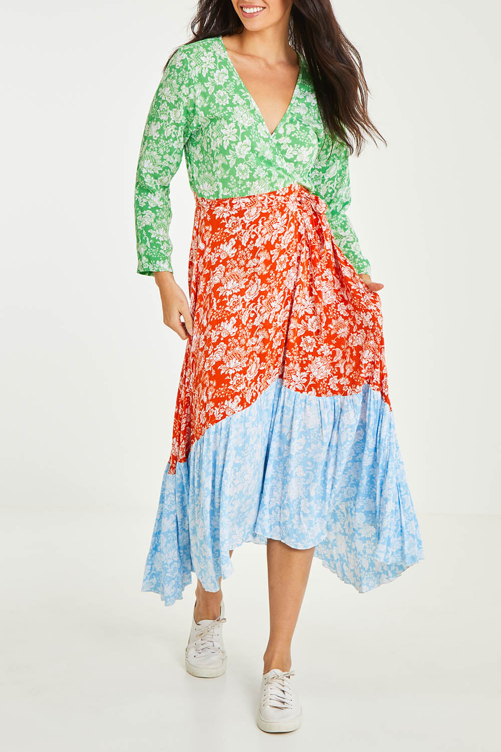 Model Stacey wearing size 10 of the Margarita Long Sleeve Dress in colour Provence (Green), from the front, cropped image