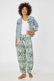 Model Olivia wearing size 10 of the Fez Pant in colour Cavendnavy (Blue), from the front, showing the whole outfit