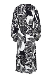 Product shot of the Mimosa Dress in colour Brazil (Black), from the back
