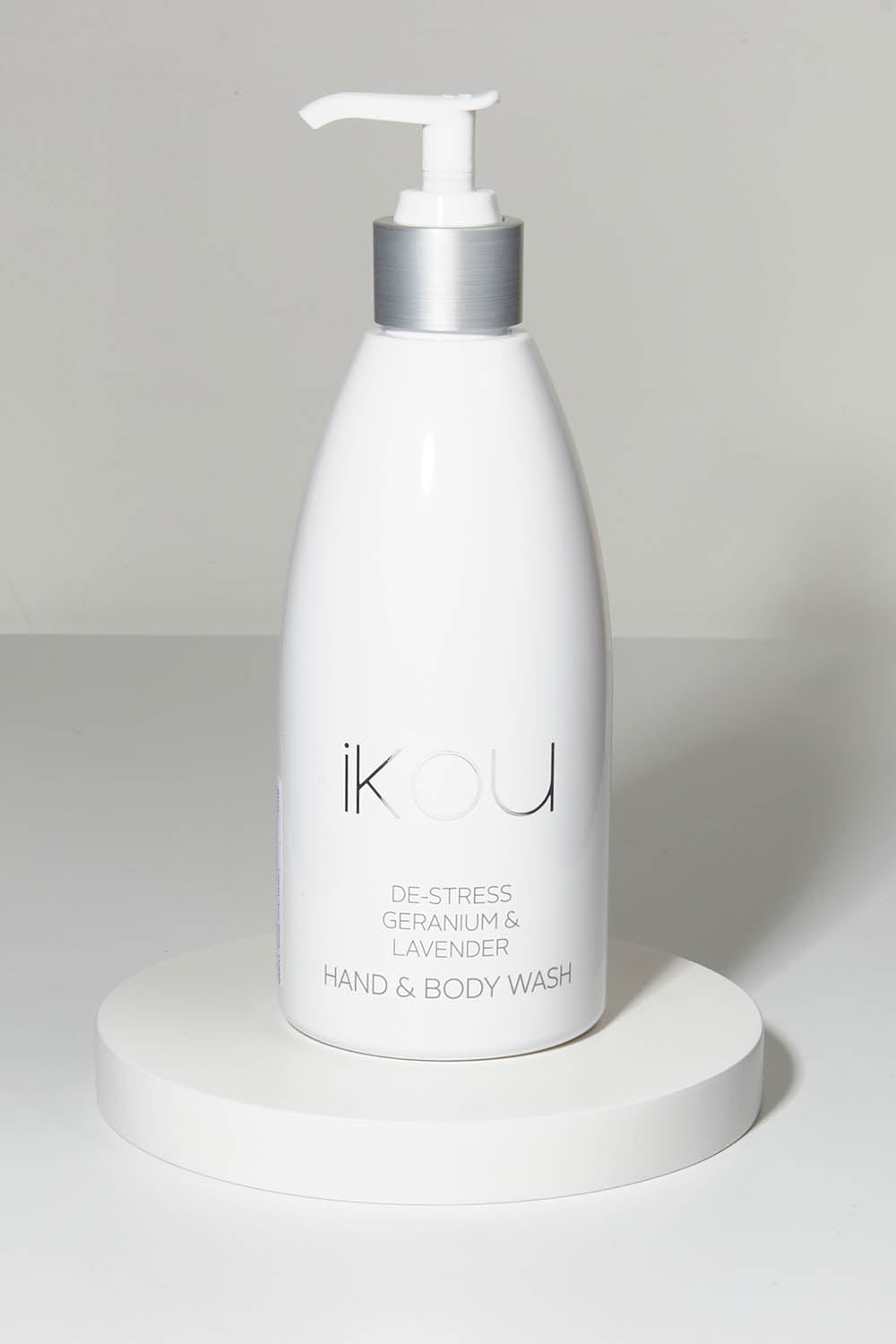 A model wearing size OneSize of the Hand And Body Wash in colour Destress (White), from the front, showing the whole outfit
