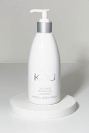 A model wearing size OneSize of the Hand And Body Wash in colour Destress (White), from the front, showing the whole outfit