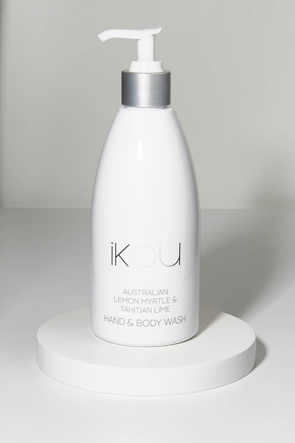 A model wearing size OneSize of the Hand And Body Wash in colour Lemonmyrt (White), from the front, showing the whole outfit
