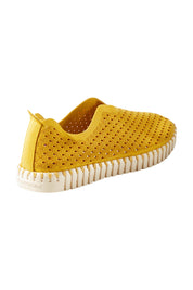 Product shot of the Tulip Sneaker in colour Goldenrod, from the back