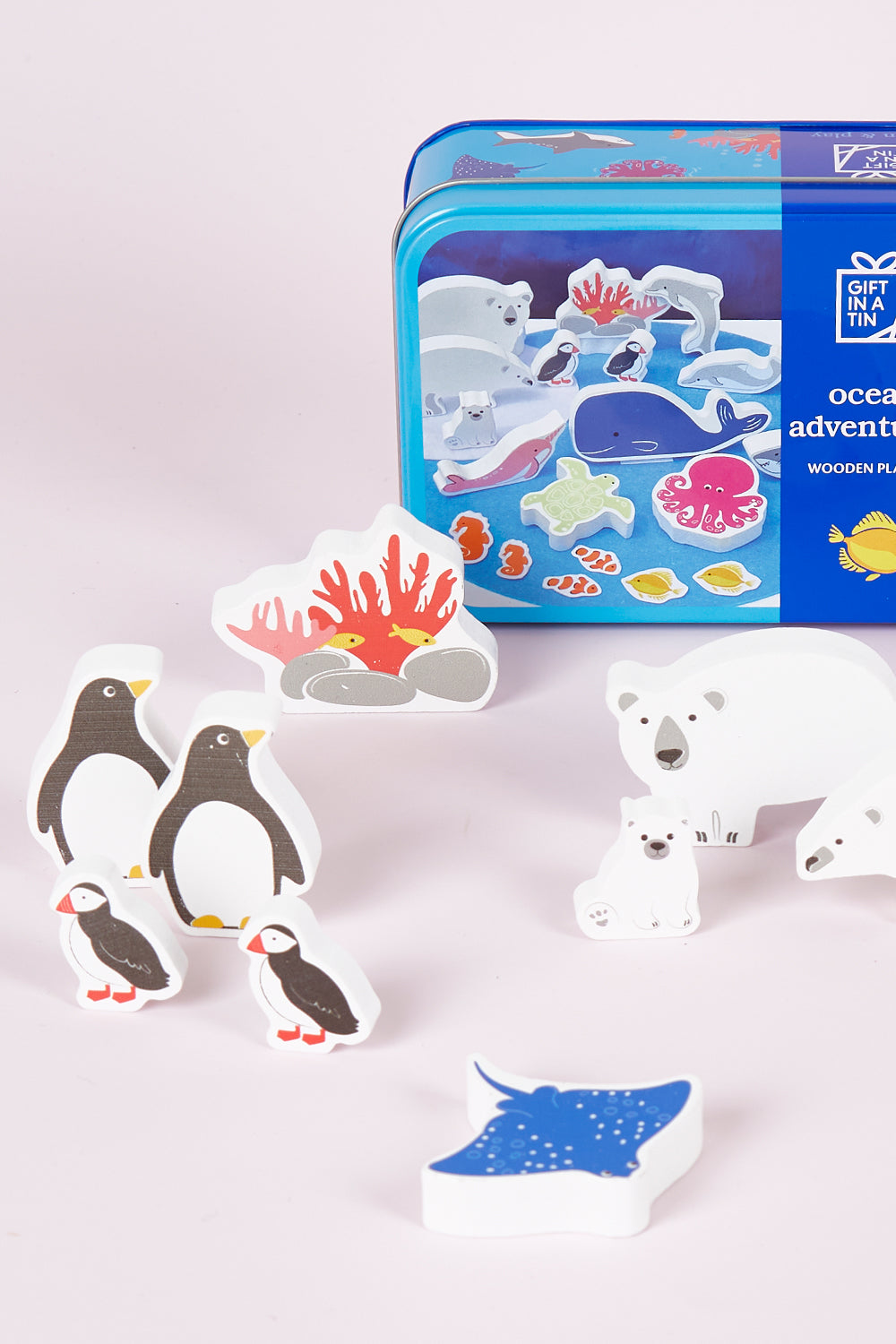 A model wearing size OneSize of the Ocean Adventures In A Tin in colour Ocean (Blue), from the front, showing the whole outfit