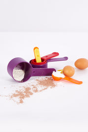 A model wearing size OneSize of the Multicoloured Nest Measuring Set in colour Multi (Purple), from the front, showing the whole outfit
