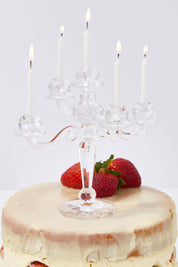 A model wearing size OneSize of the Fancy That Cake Candle Candelabra in colour White (White), from the front, showing the whole outfit