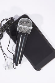 A model wearing size OneSize of the 2.0 Smart Phone Karaoke in colour Black (Black), from the front, showing the whole outfit