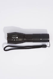 A model wearing size OneSize of The Ultimate Led Zoom Flashlight in colour Black (Black), from the front, showing the whole outfit