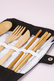 A model wearing size OneSize of the Bamboo Travel Cutlery Set With Carabiner in colour Black (Black), from the front, showing the whole outfit