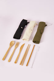 A model wearing size OneSize of the Bamboo Travel Cutlery Set With Carabiner in colour Black (Black), from the front, showing the whole outfit