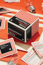A model wearing the Delightfully Useless Trivia in colour Red (Red), from the front, showing the whole outfit