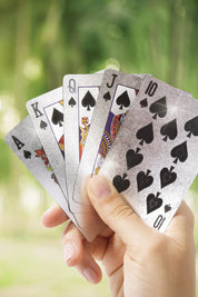 A model wearing the Waterproof Playing Cards in colour Khaki (Green), from the front, showing the whole outfit