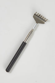 A model wearing size OneSize of the Telescopic Back Scratcher in colour Steel (Metallics), from the front, showing the whole outfit