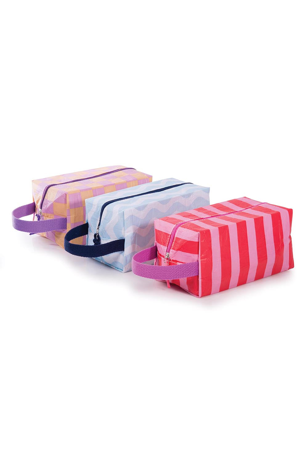 Product shot of the Fly With Me Toiletries Bag - Purple in colour Purple, from the back