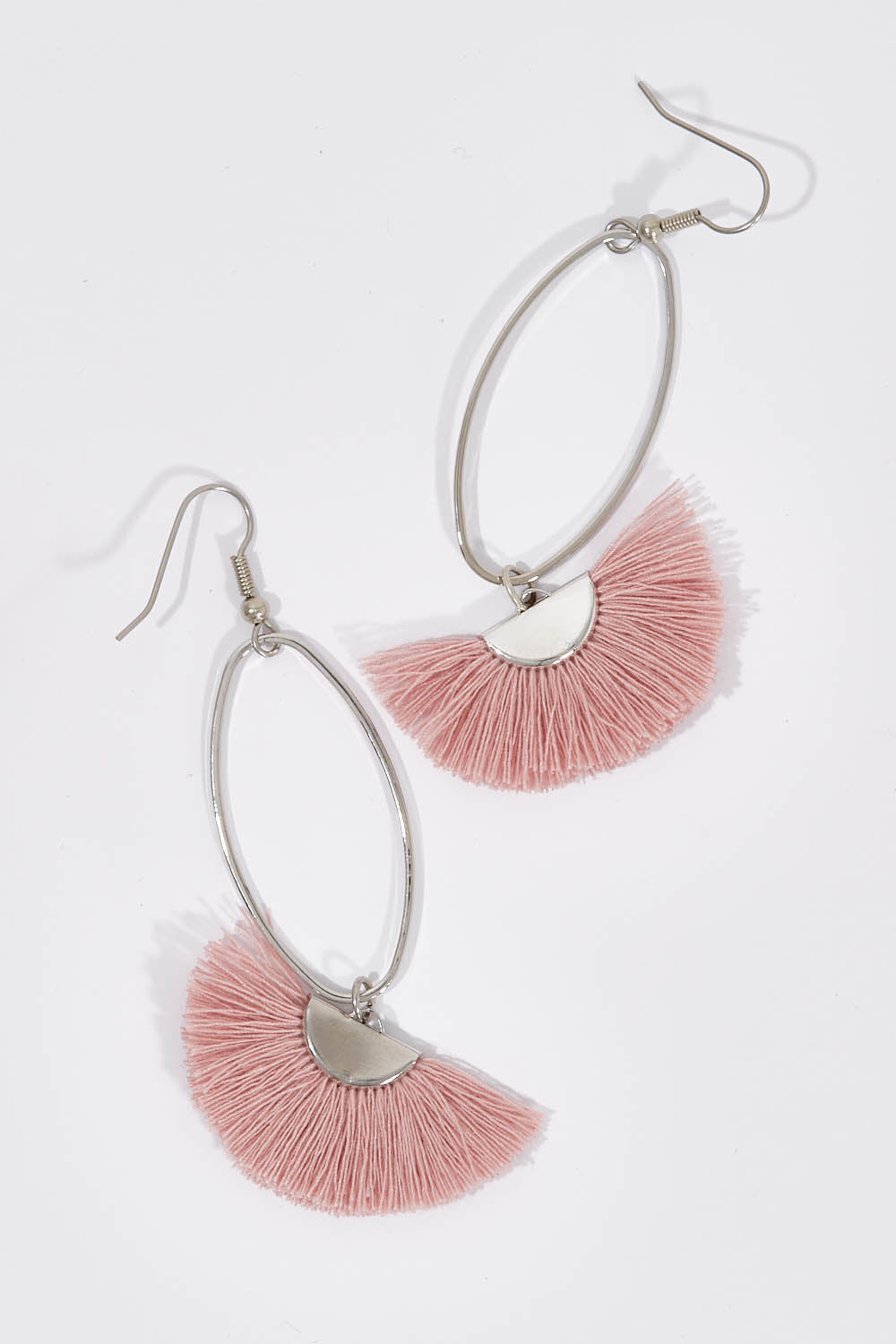 A model wearing size OneSize of the Silver Caprioska Tassel Earrings in colour DustyPink (Pink), from the front, showing the whole outfit