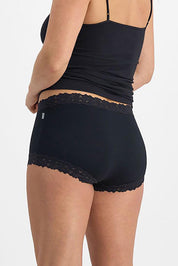 A model wearing the Parisienne Cotton Full Brief in colour Black (Black), from the back