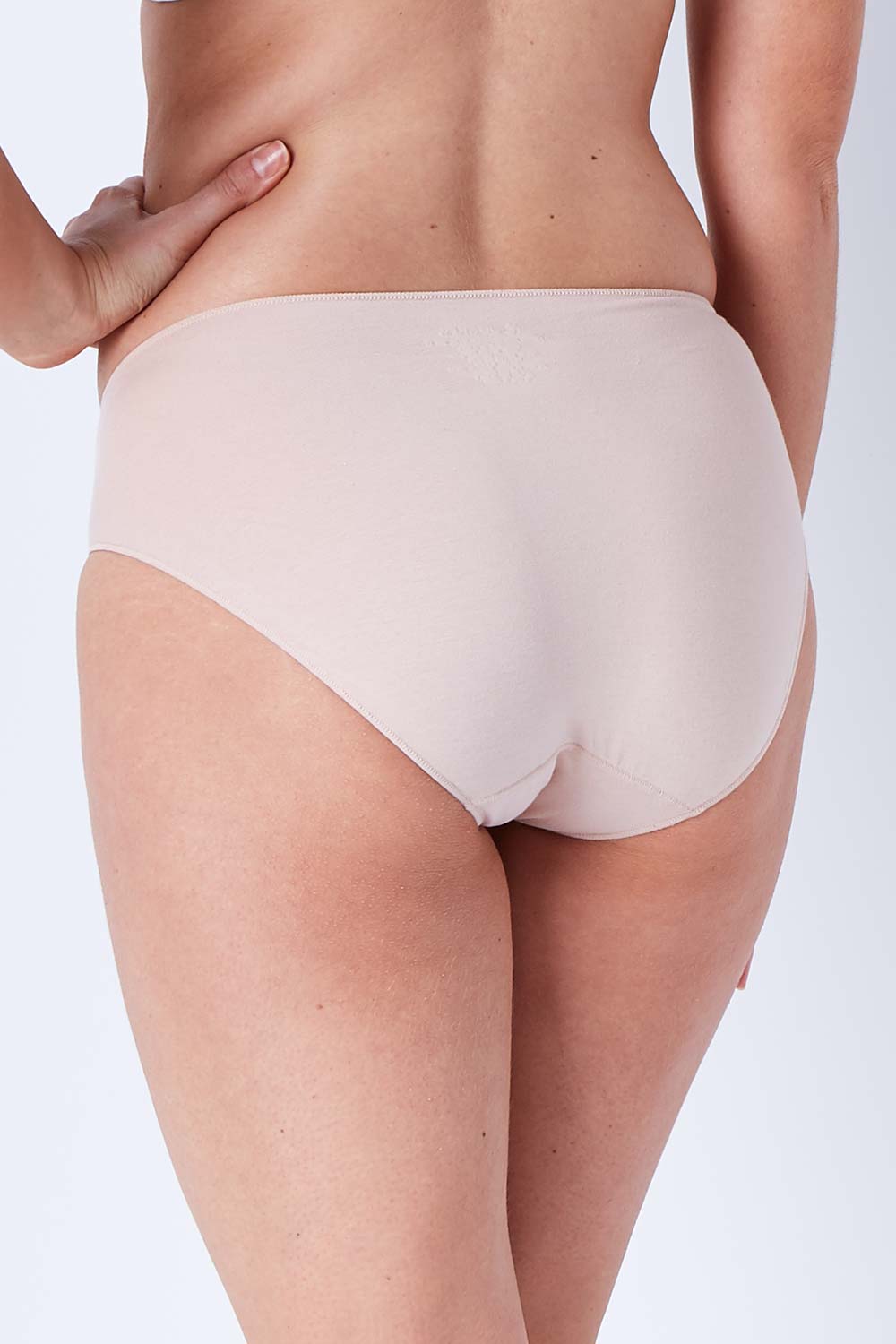 Model Phoebe wearing size 10 of the Bamboo Naturals Hi Cut Brief in colour Dusk, from the back