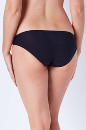 Model Phoebe wearing size 10 of the Bamboo Naturals Bikini Brief in colour Black (Black), from the back