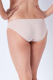 Model Phoebe wearing size 10 of the Bamboo Naturals Bikini Brief in colour Dusk, from the back