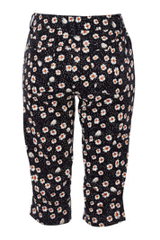 Product shot of the Delightful Daisy Capri Pants in colour Blackmulti (Black), from the back