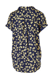 Product shot of the Dela Shirt in colour Navyflora (Blue), from the back