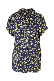 Product shot of the Dela Shirt in colour Navyflora (Blue), from the front