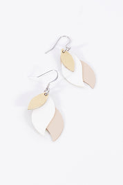 A model wearing size OneSize of the Australian Made Leather Leaf Earring in colour Goldwhite (Metallics), from the front, showing the whole outfit