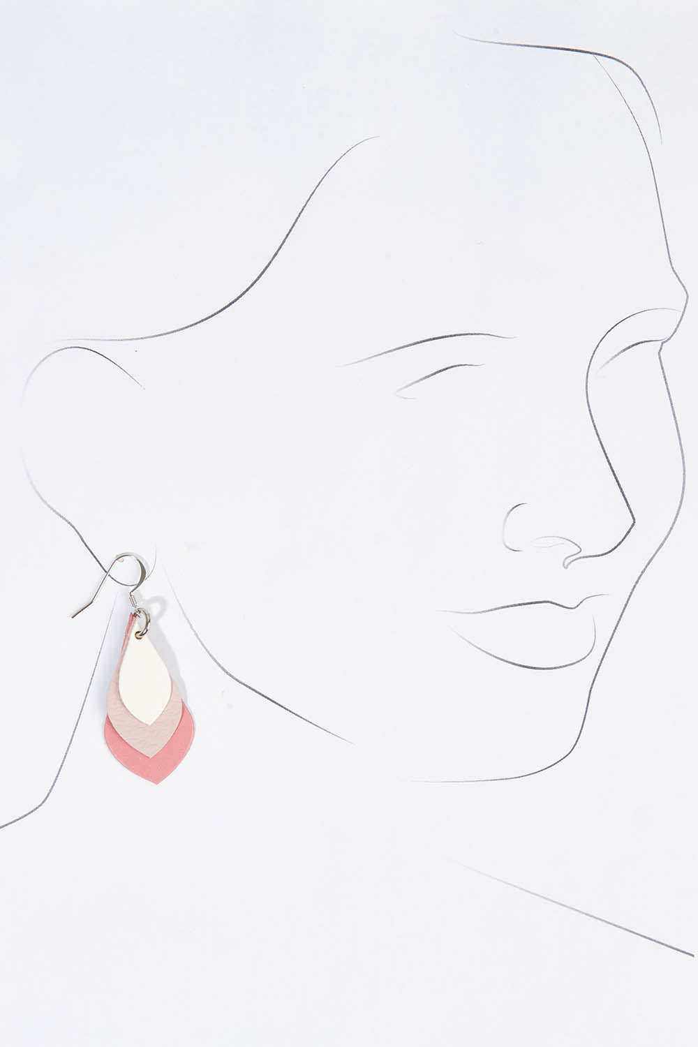 A model wearing size OneSize of the Australian Made Leather Teardrop Earring in colour Pinkwhite (Pink), from the front, showing the whole outfit