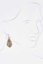 A model wearing size OneSize of the Australian Made Leather Teardrop Earring in colour Rosesilver (Metallics), from the front, showing the whole outfit