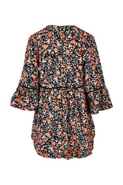 Product shot of the Aria Top in colour Blackprint (Black), from the back