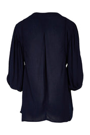 Product shot of the Drifter Top in colour Navy (Blue), from the back