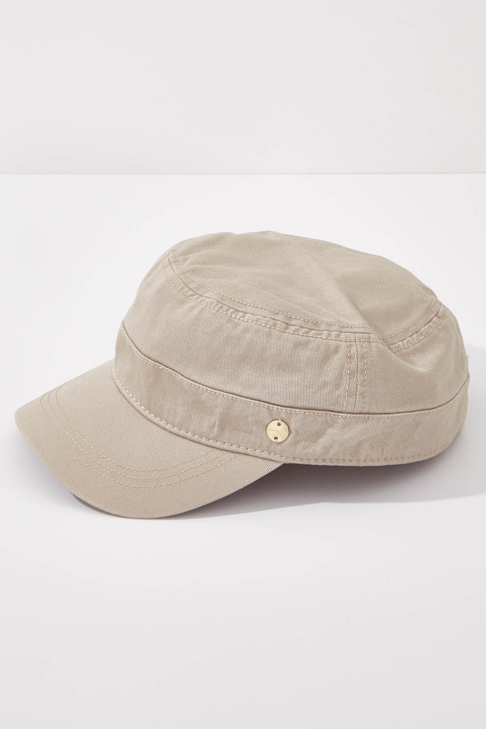 A model wearing size OneSize of the Marley Mao Cap in colour Latte, from the front, showing the whole outfit