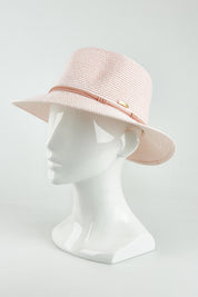 A model wearing the Canwell Packable Safari Hat in colour Blush (Pink), from the front, showing the whole outfit