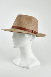 A model wearing the Kallie Merino Wool Safari Hat in colour Natural, from the front, showing the whole outfit